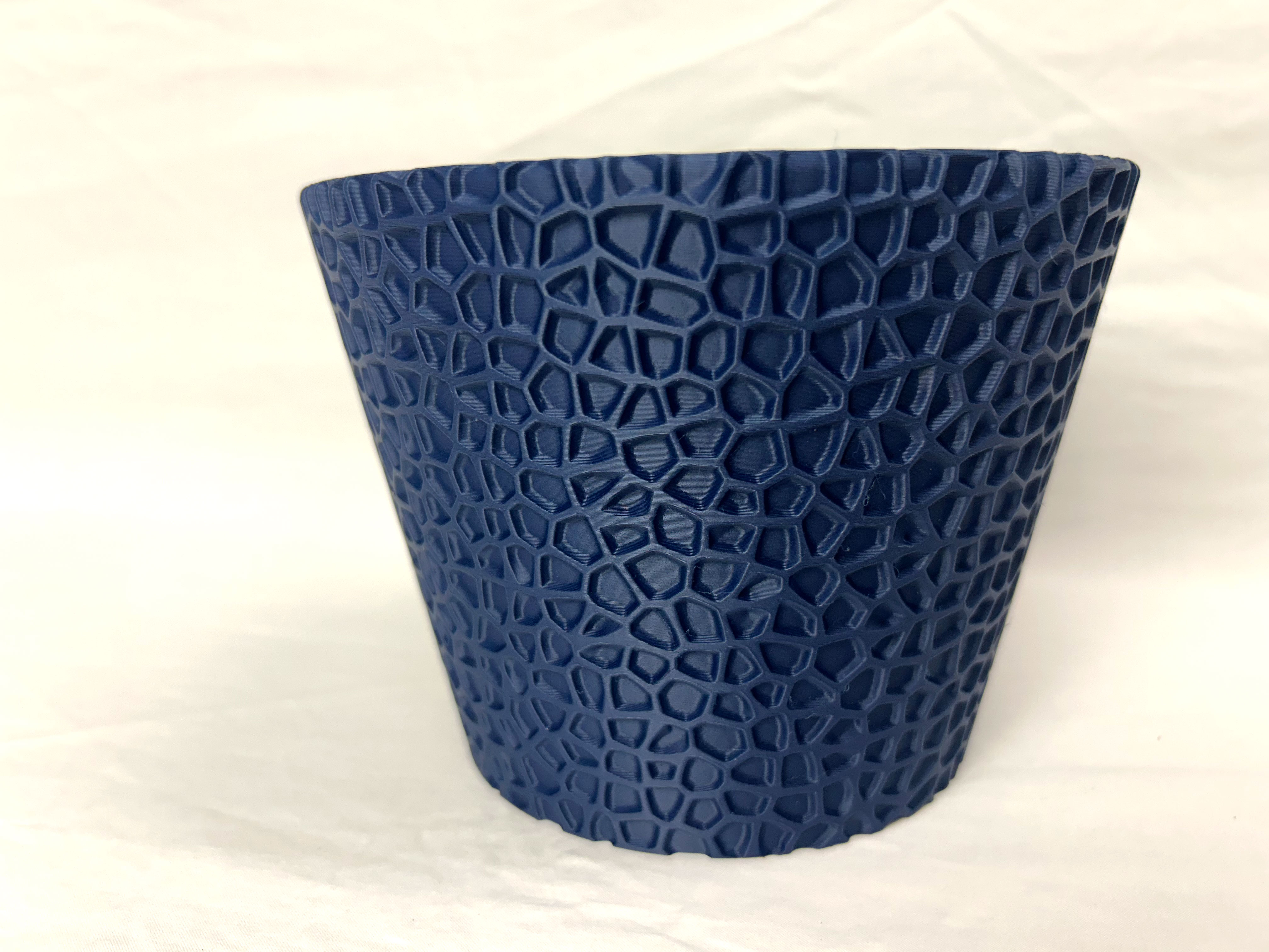 Brown twisted hexagon with vertical ribs